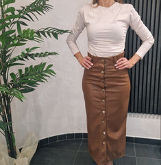 Gonna in pelle con bottoni centrali