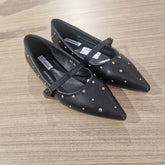 Scarpe a punta con suola rialzata