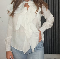 Camicia con volant e fiocco sul collo