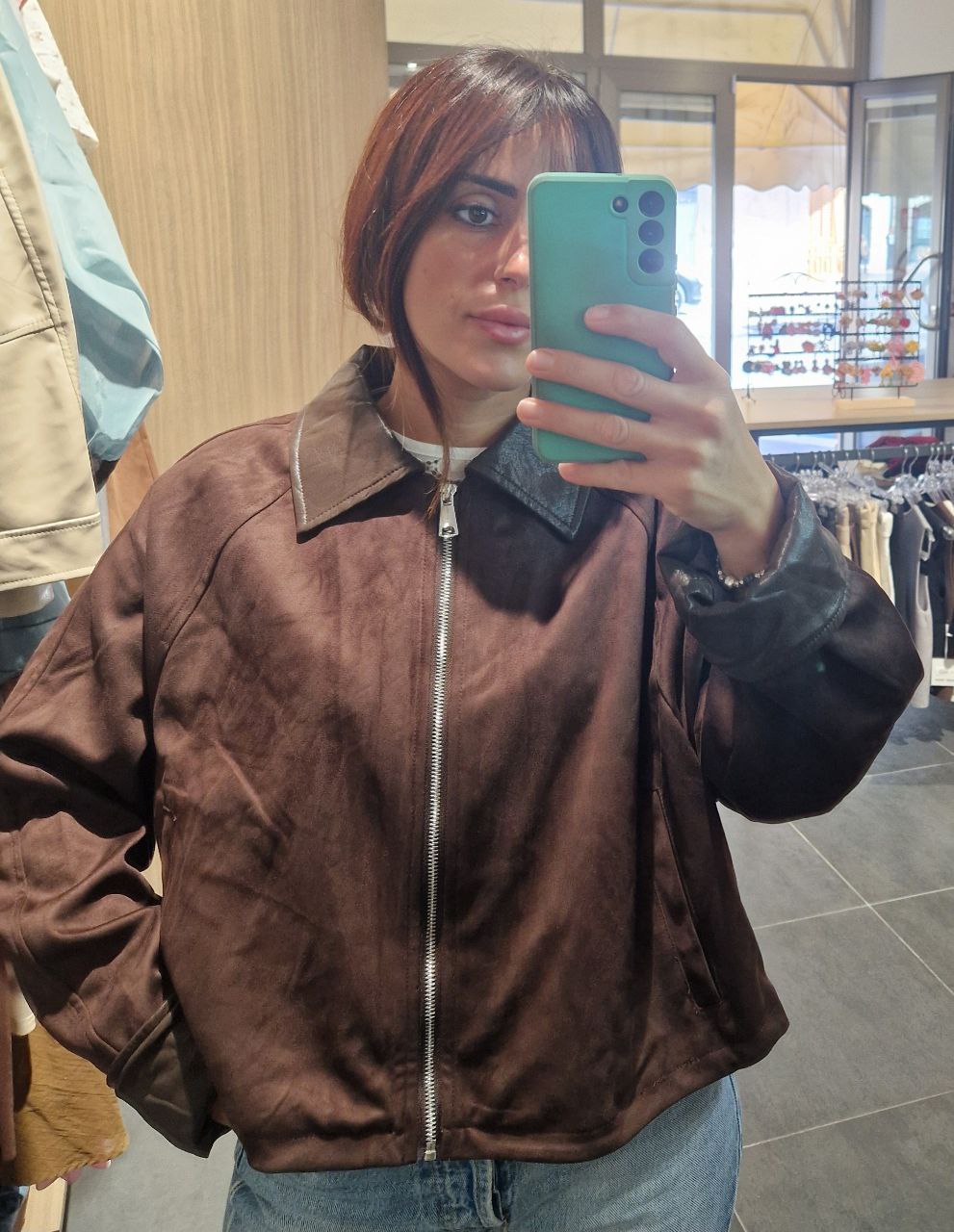 Giubbotto in rena con bordi in pelle